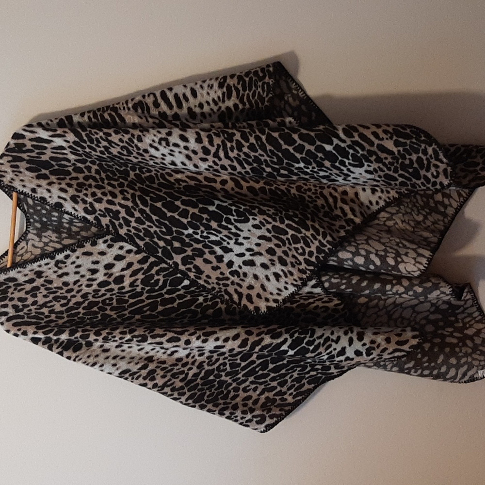 Leopard Print ponchos.  One size